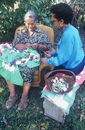 <b>Gladys Wicker and her neice folklorist Joyce M. Jackson.</b> East Baton Rouge Parish, LA, November 1990.
