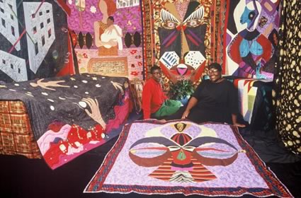 <b>Damian P. Mazloomi and his mother, Dr. Carolyn Mazloomi, founder and coordinator of the <i>Women of Color Quilters' Network</i>.</b> Cincinnati, OH, July 1993.