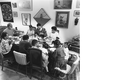 <b>The children and grandchildren of Barbara and Sinclair Whiteman assemble for a Sunday dinner.</b>  The good-natured banter of family members is indicative of the family's cohesion.  Philadelphia, PA, 1988.