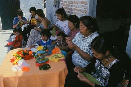 <b>Village women making story blocks for miracle quilts</b>, San Miguel de Allende, Mexico, 2000.