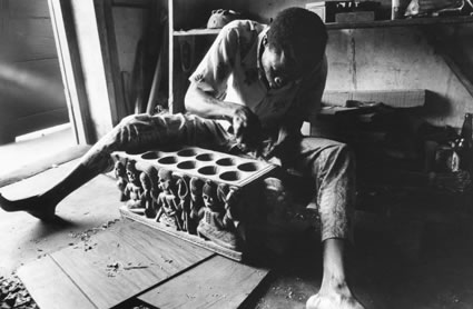 <b>Woodcarver.</b>  Oyo, Nigeria, 1981.